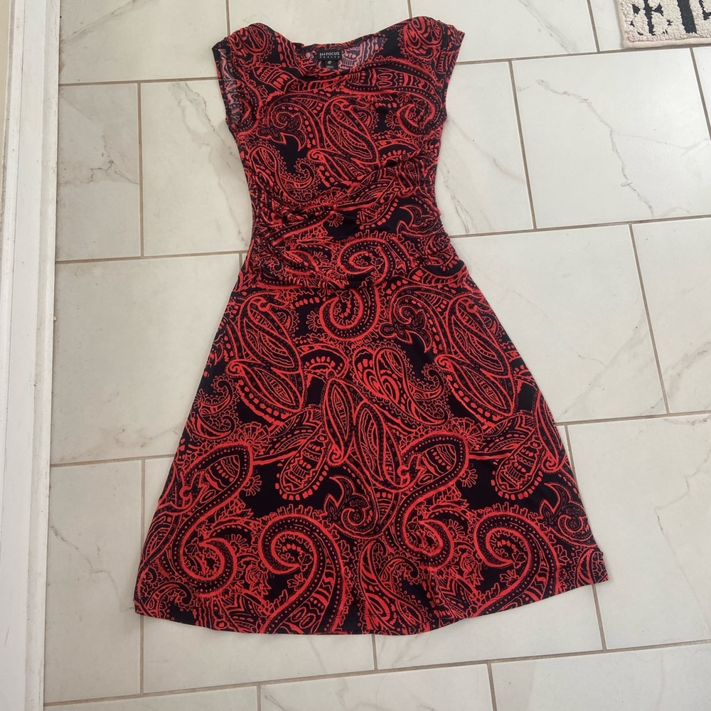 Dress. Orange-Reddish and Navy bluish black.